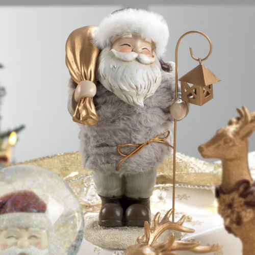 Santa claus in resina con lanterna